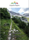 Das Bild zeigt das Titelbild der Karte vom Spitzenwanderweg. Hierauf zu sehen ist ein schmaler Pfad in alpinem Gelände. Berggipfel und grüne Bewaldung rundherum.